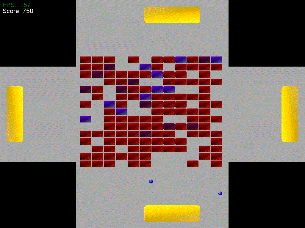 A series of red and blue blocks in the centre of a cross shaped play area. Four paddles sit between the edges of the screen and the blocks, and two balls bounce at the bottom of the screen.